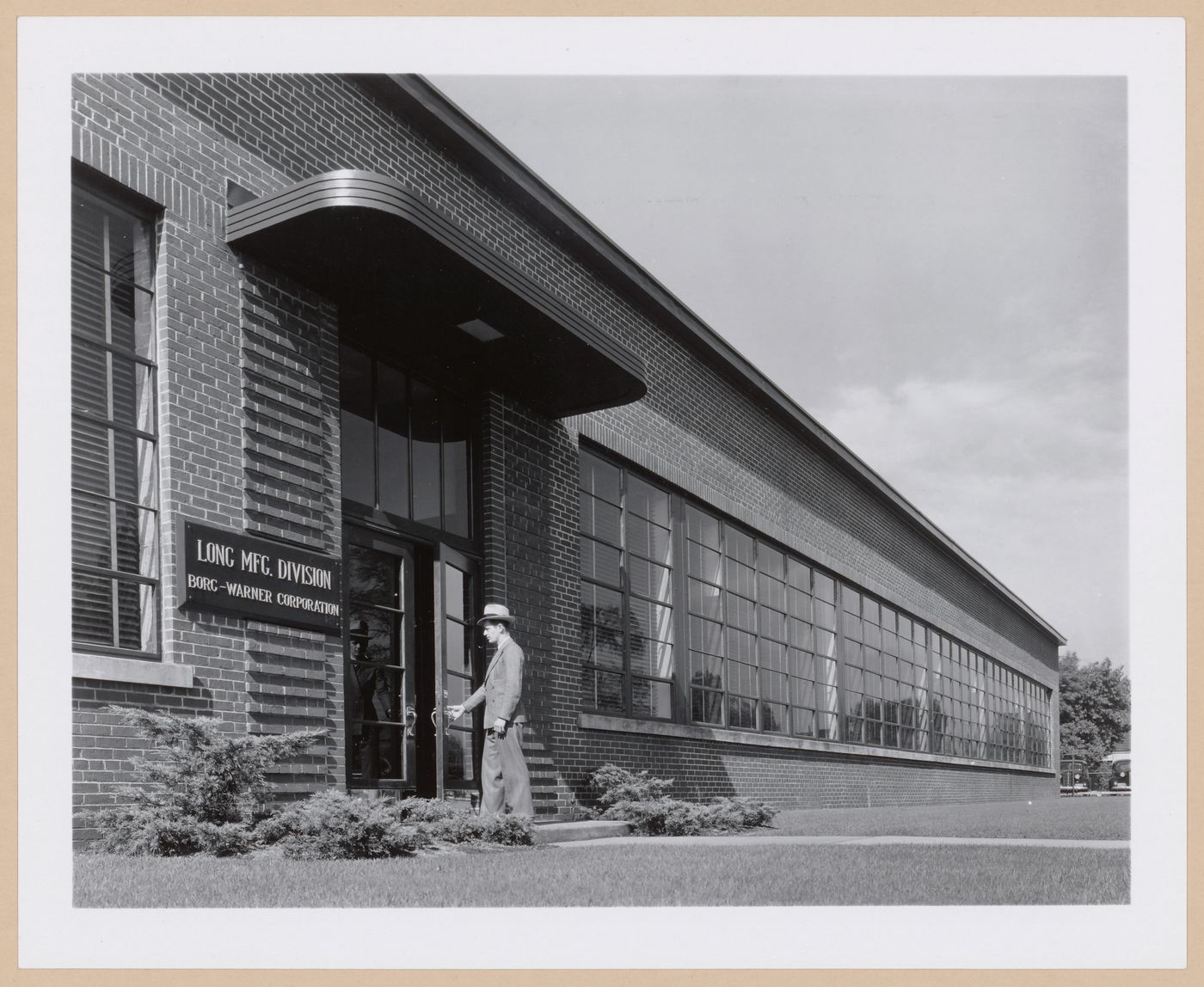 View of the main entrance of the addition to the Administration Building, Borg-Warner Corporation Long Manufacturing Company division Assembly [?] Plant, Detroit, Michigan