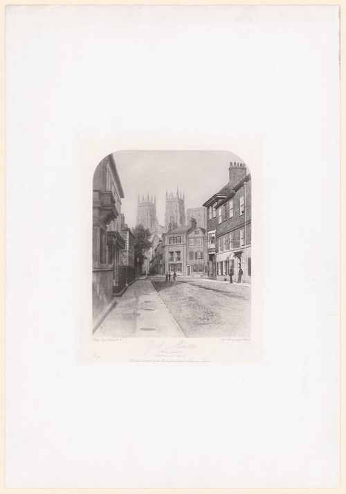 General view of street and houses, towers of York Minster visible in distance, York, England