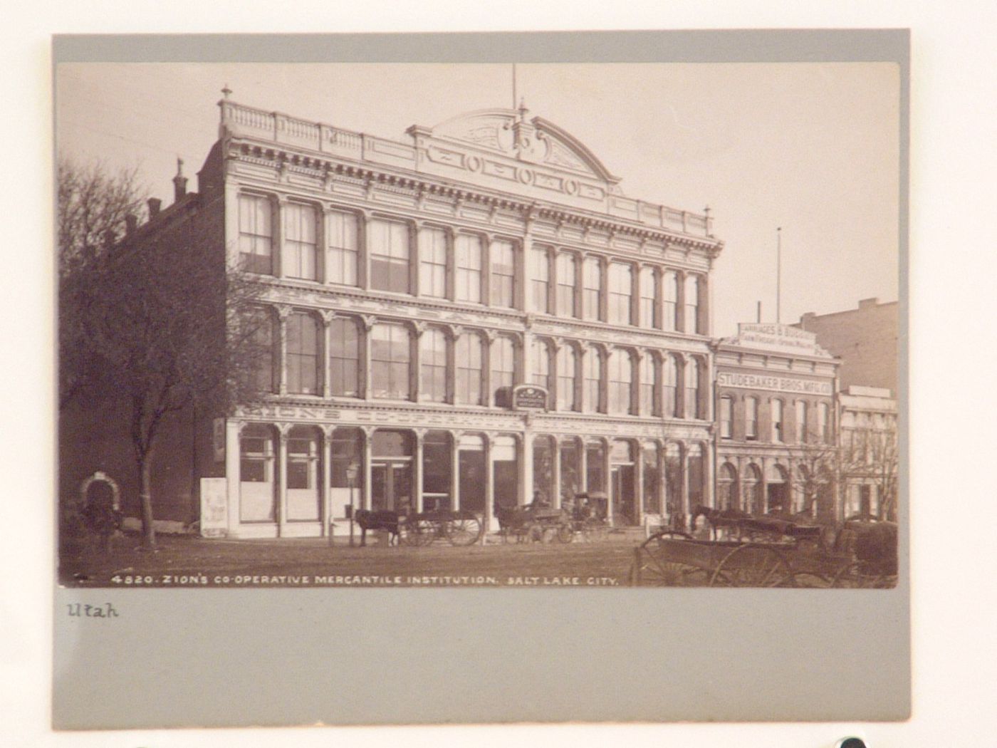 View of Zion's Co-operative Mercantile Institution with Studebak Brothers Manufacturing Company on the right, Main Street (now 15 South Main Street), Salt Lake City, Utah, United States