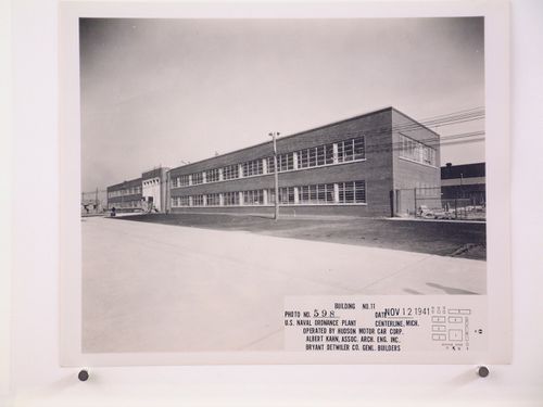 View of the principal and lateral façades of the Administration Building (also known as Building No. 11) under construction, United States Naval Ordnance Assembly Plant, Center Line, Michigan
