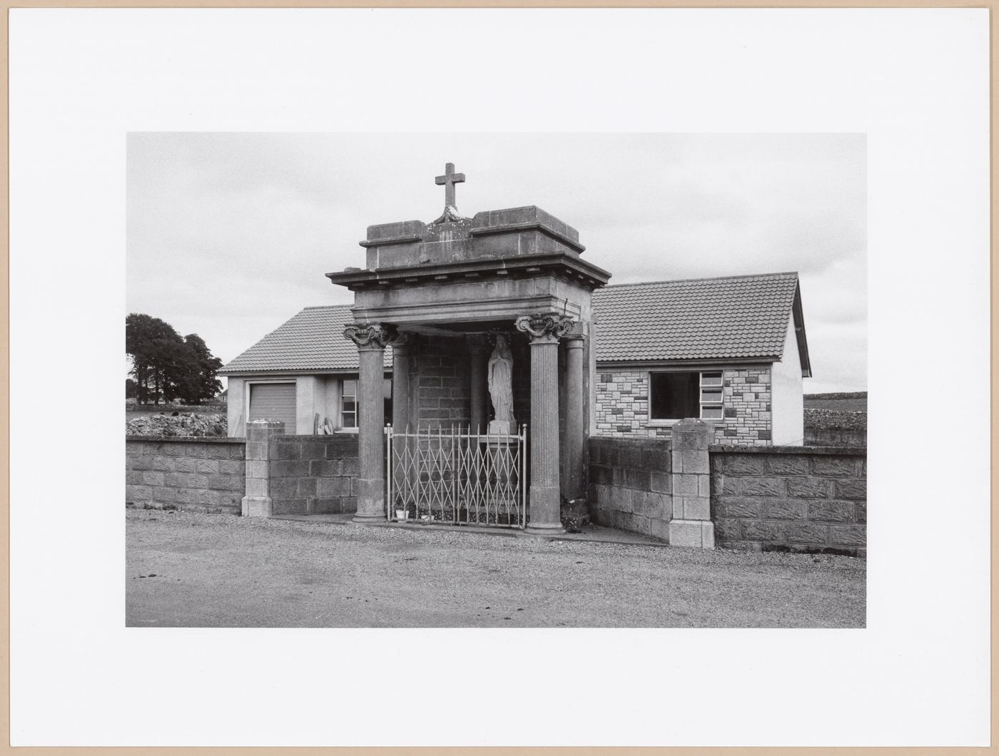 Bungalow behind road-side shrine with statue of The Virgin, Athleague, County Roscommon, Ireland