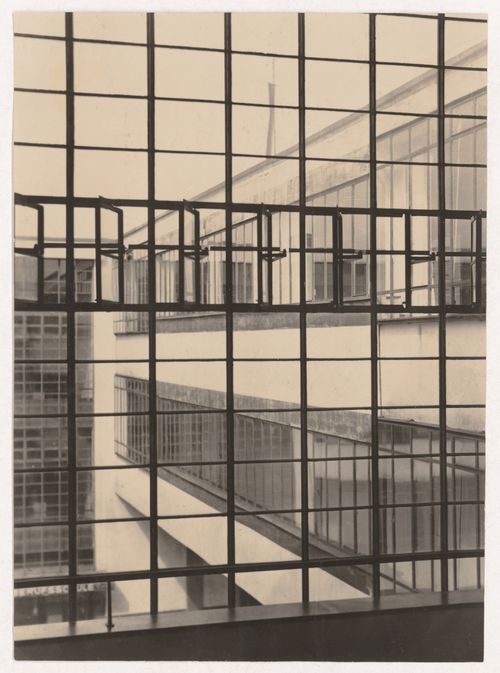 Exterior view of the Bauhaus building showing the housing wing of Dessau Technical School and the administration wing through a window, Dessau, Germany