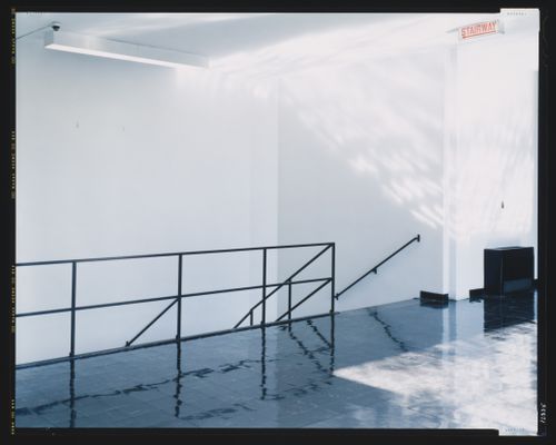 Interior view of a stairwell and landing in Perlstein Hall, Illinois Institute of Technology, Chicago, Illinois