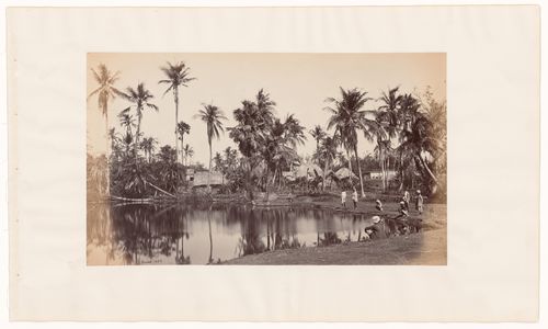 View of a pond and a village in Bengal (now West Bengal), India
