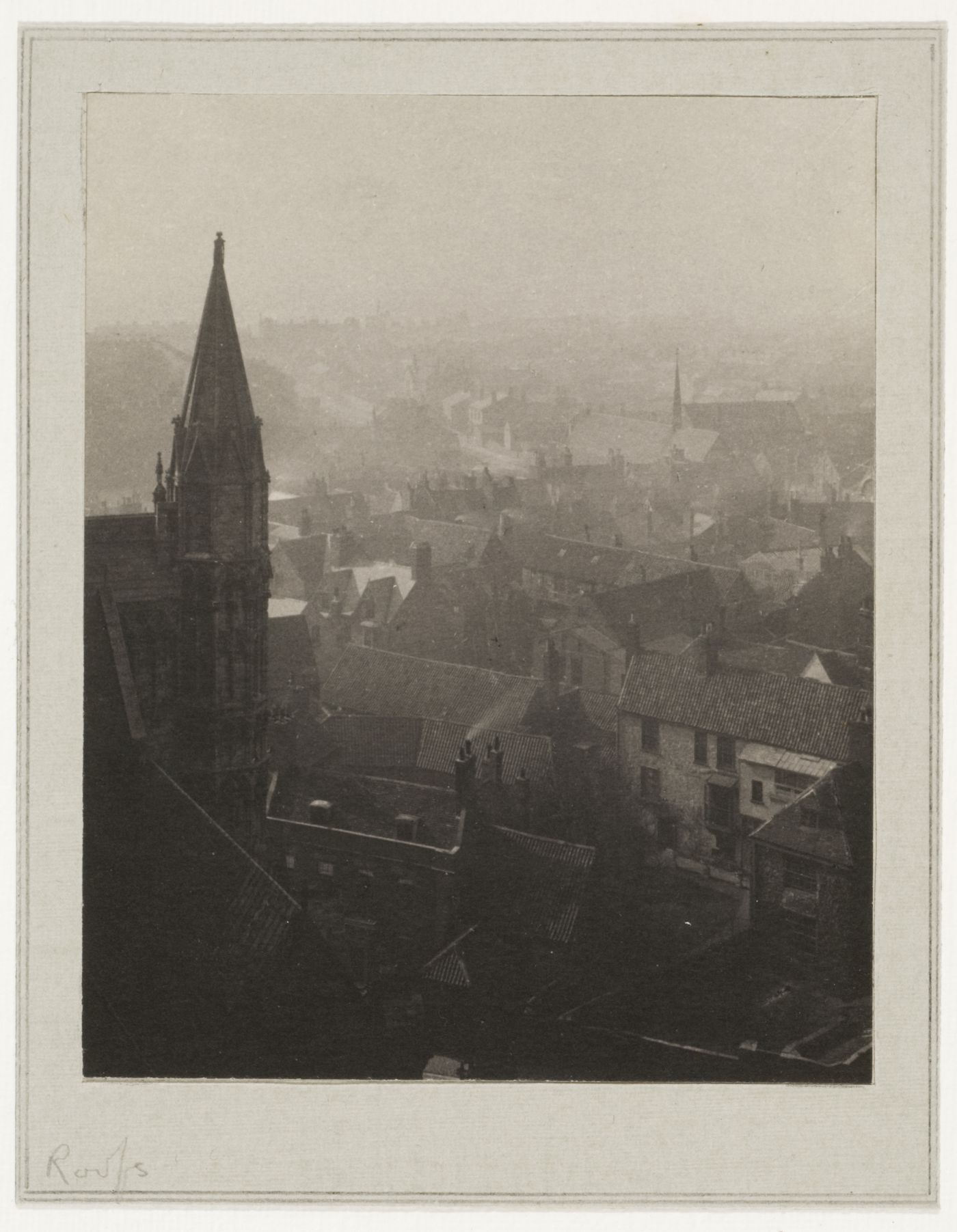 View of the bell tower of Lincoln Cathedral and surrounding roof-tops, Lincoln, England