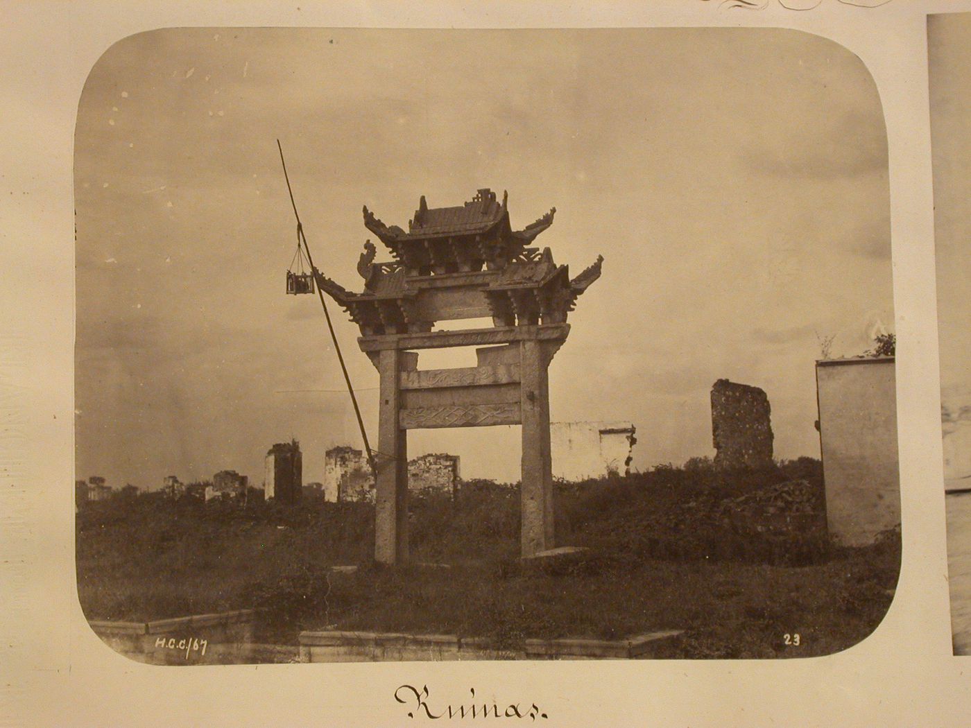 View of a stone gateway leading to ruins