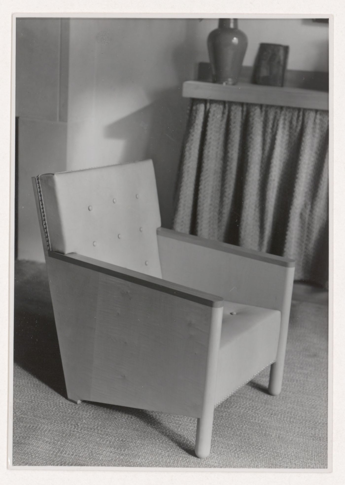 Interior view of Hanema House II showing an armchair designed by J.J.P. Oud, Rotterdam, Netherlands