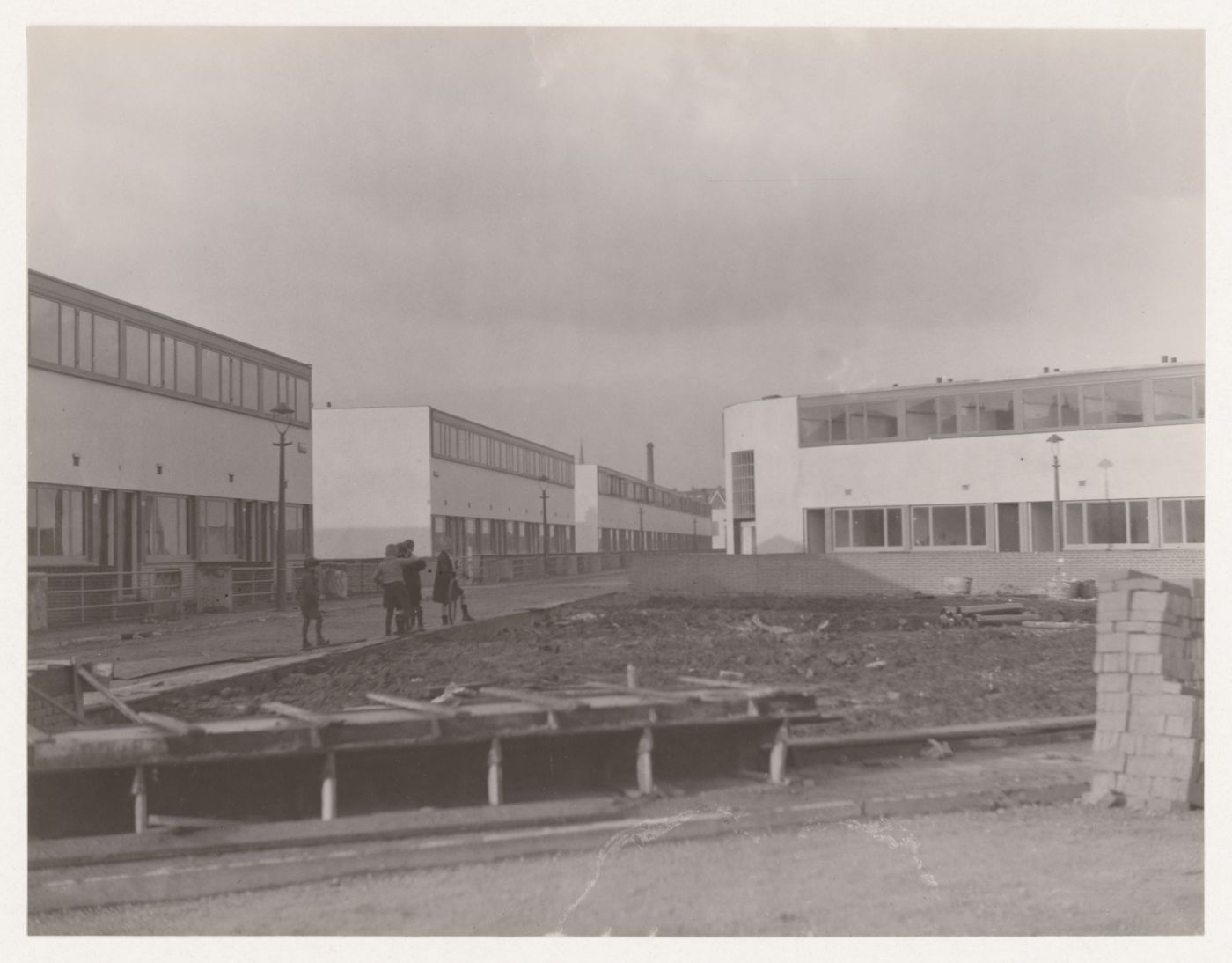 Exterior view of Kiefhoek Housing Estate showing a playground under construction, Rotterdam, Netherlands