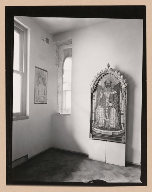 Interior view of the corner of a gallery showing two paintings, Palazzo Abatellis, Galleria regionale della Sicilia, Palermo, Italy