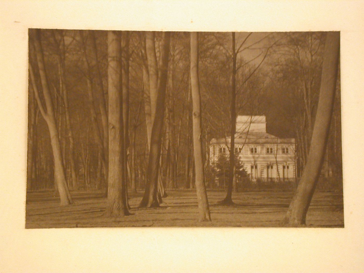 Distant view of the White Cottage, also known as the White House, Lazienki Park, Warsaw, Poland