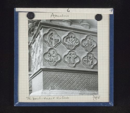 View of relief sculpture of vices and virtues of west portal of Cathédrale d’Amiens, Amiens, France