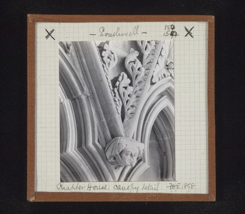 Detail view of canopies with sculpture of head in Chapter House, Southwell Minster, Southwell, Nottinghamshire, England