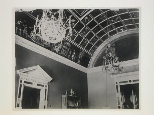 Interior view of the Tarasov Mansion showing a vaulted compartment ceiling with chandeliers and decorated doorframes, Moscow