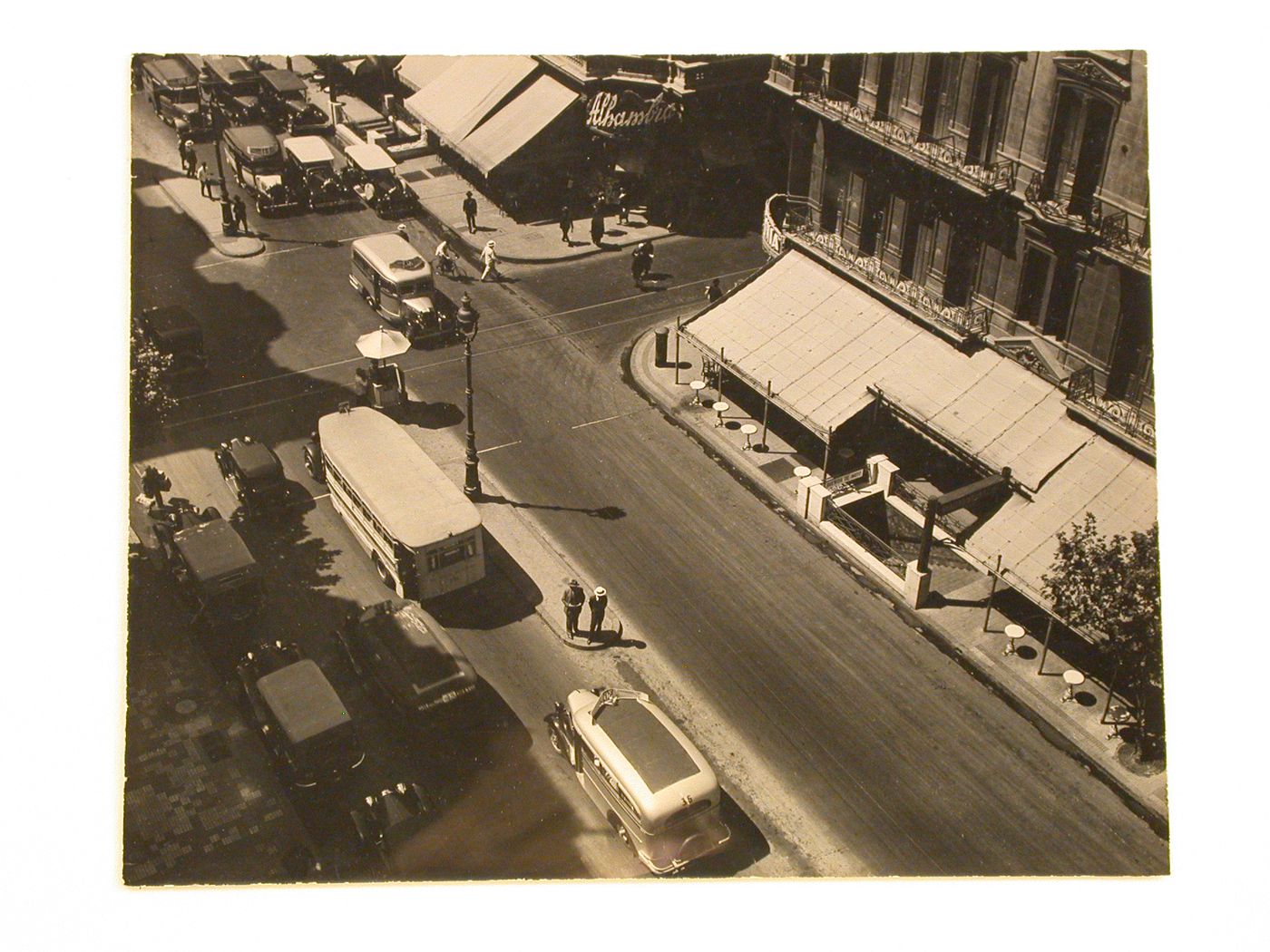 Aerial view of an intersection showing automobiles, buildings and the enterance to the underground railway station "Avenida de Mayo", Buenos Aires, Argentina