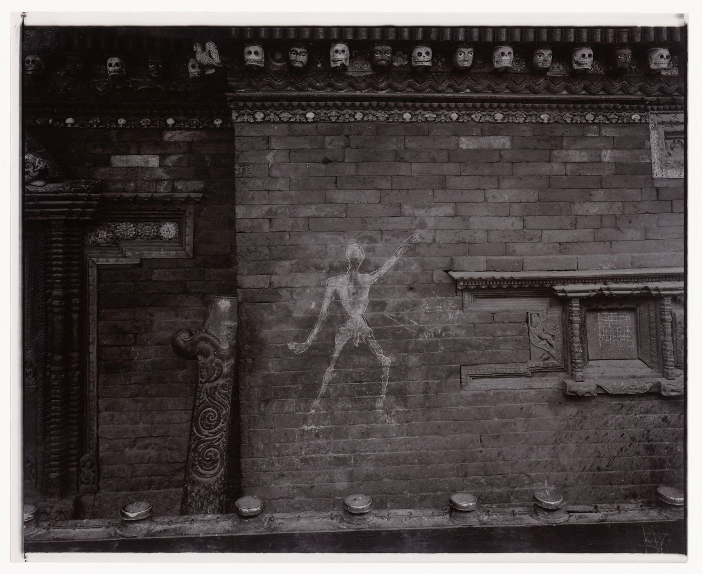 Partial view of a wall of a temple showing a figure drawn in chalk, Kathmandu, Nepal