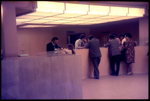 View of people and interior of Banco Pinto & Sotto Mayor, agência e clube, Lamego, Portugal