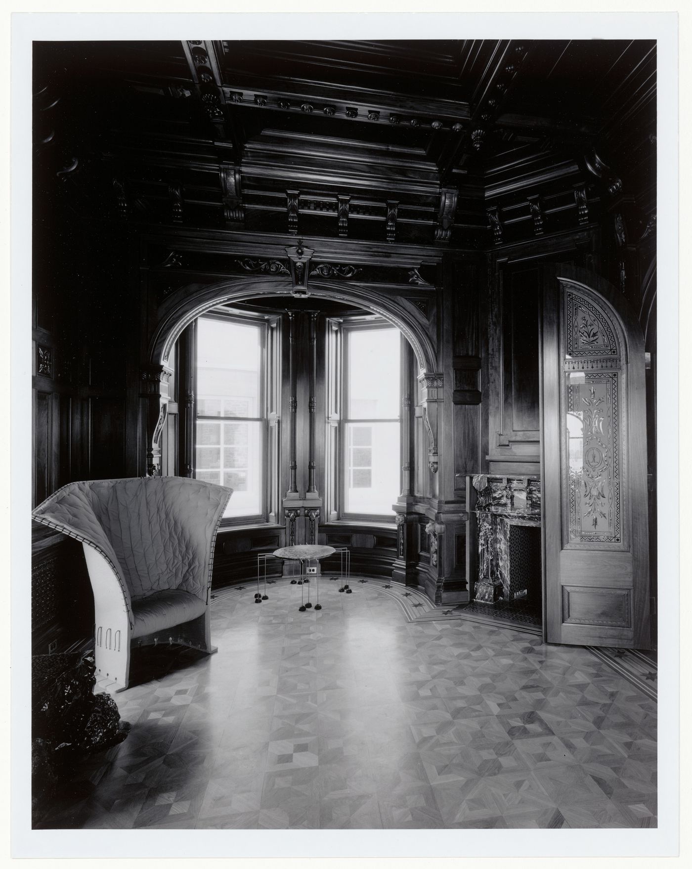 Interior view of the tea room showing a Feltri Armchair and the Table with Twelve Legs, Shaughnessy House, Montréal, Québec