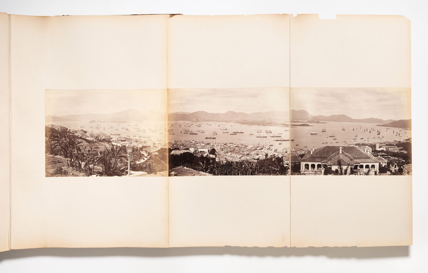 Panorama of Hong Kong (now Hong Kong, China), Hong Kong harbour and Kowloon Peninsula showing the Albany and other buildings, and ships