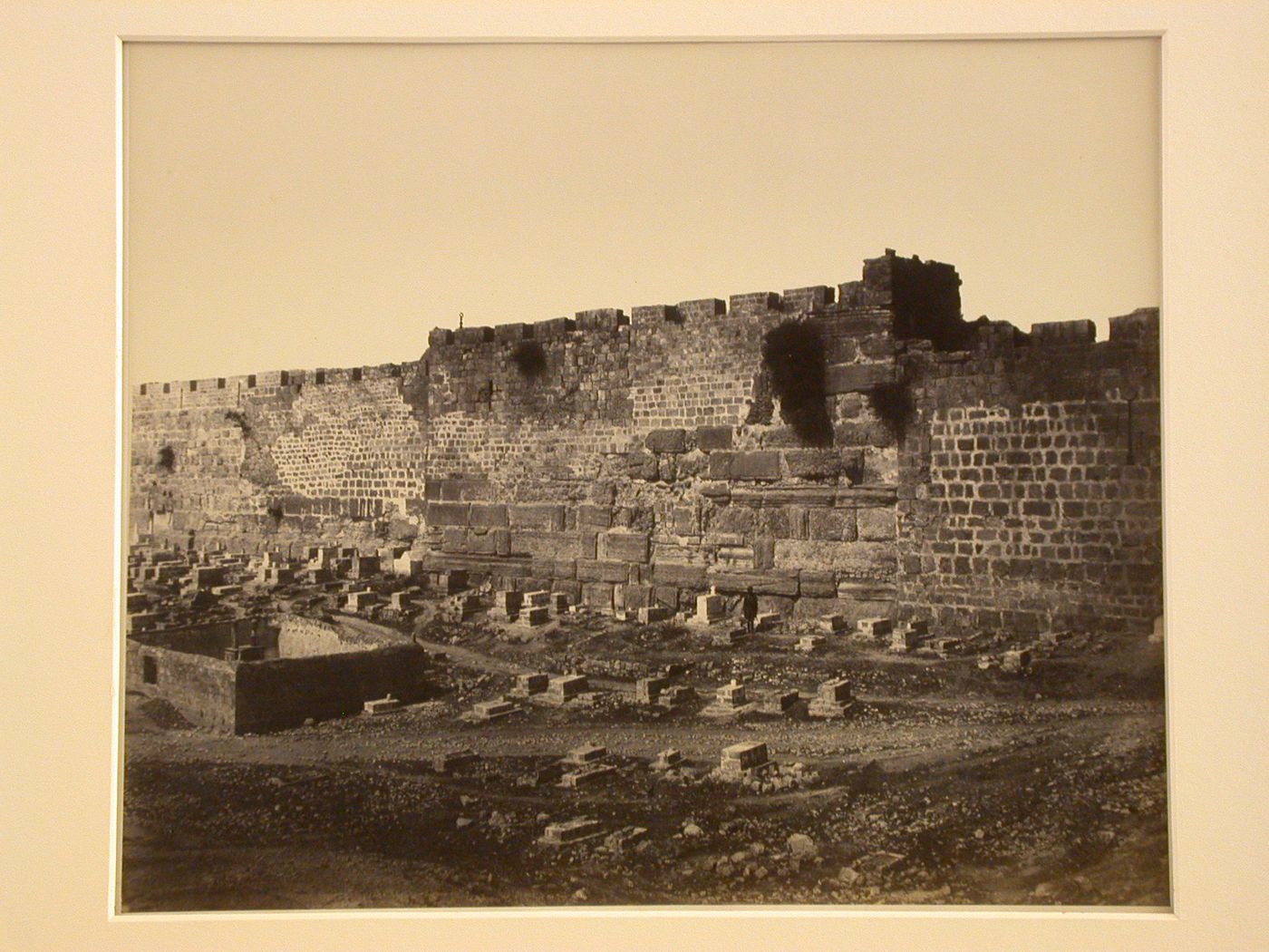 City wall, East side, immediately south of Bàb Sitti Maryam (St.Stephen's Gate), forming east wall of Temple mount (Haram) with Muslim cemetery in foreground, Jerusalem, Palestine.