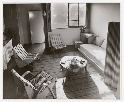 Interior view of a furnished living room in a one storey duplex
