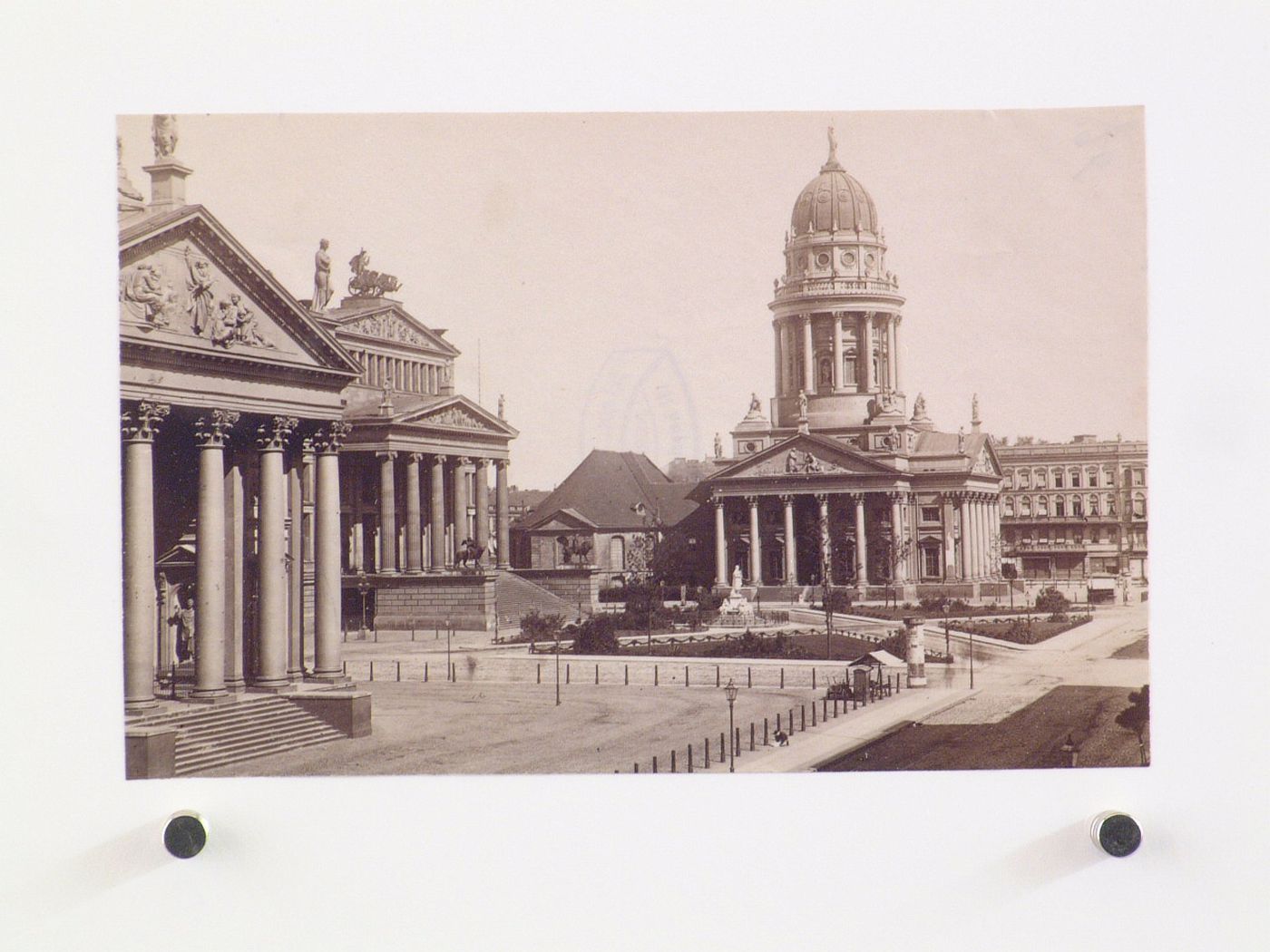 View of Gendarmenmarkt [Soldier's Market] (formerly Platz der Akademie) showing the Deutsche Kirche [German Church] in the left foreground, Schauspielhaus [Concert Hall] on the left and Französische Kirche [French Church] in the centre, Berlin, Germany