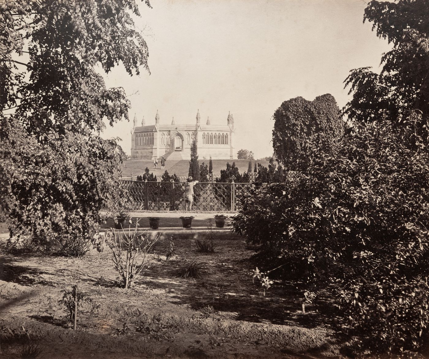 View of the Municipal Gardens (also known as the Memorial Well Gardens) and the Memorial Well, Cawnpore (now Kanpur), India
