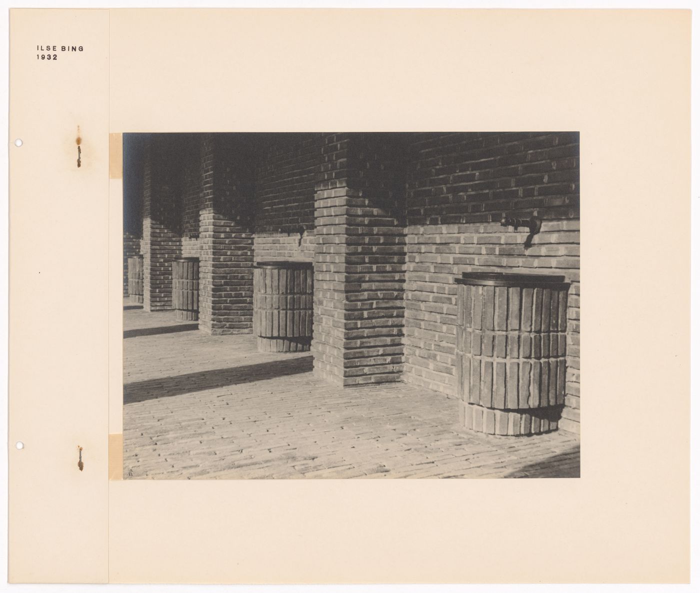 View of a brick wall and sinks in the New Jewish Cemetery [Neuer Jüdischer Friedhof], Frankfurt am Main, Germany