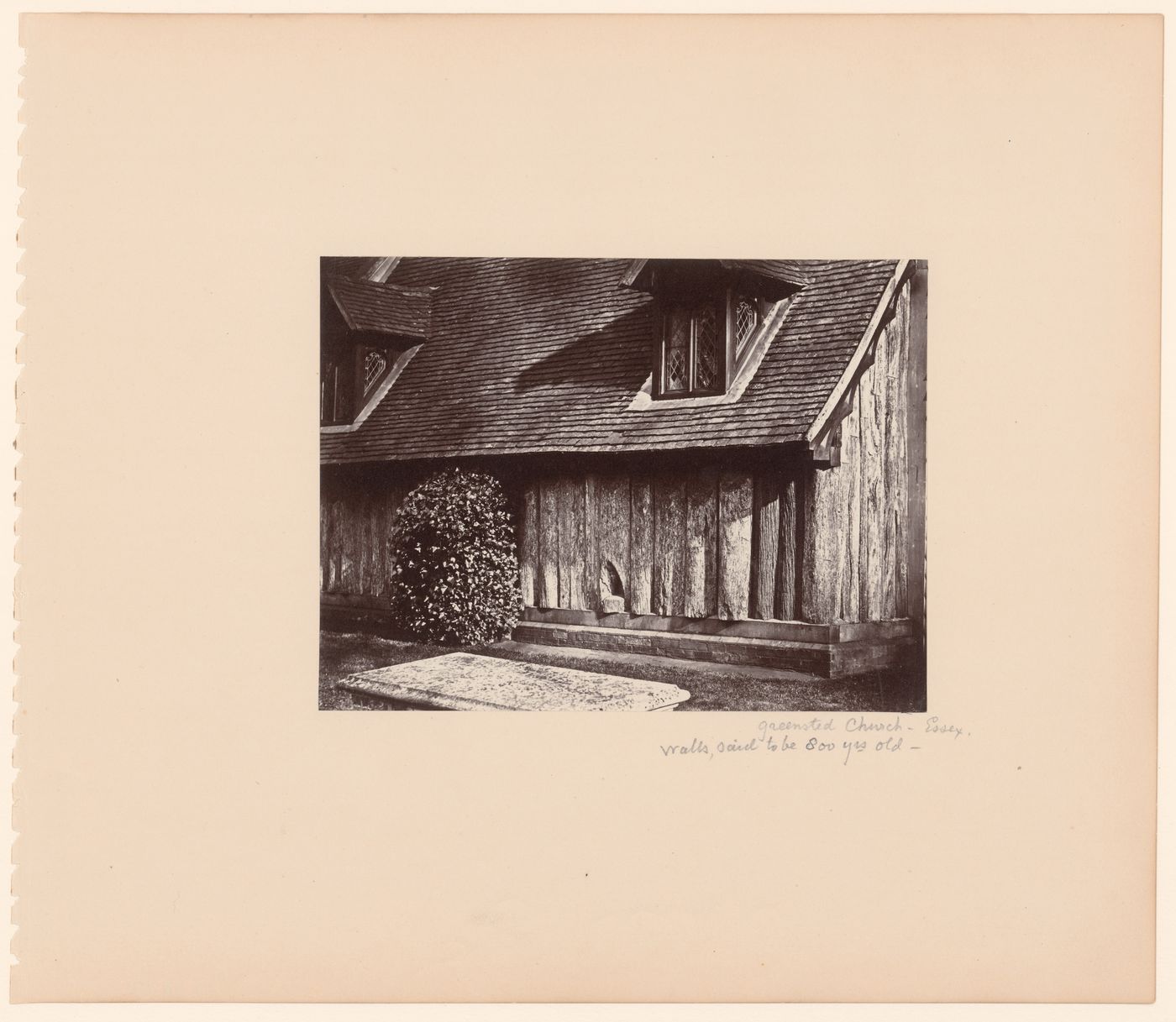 View of exterior wall and windows at Greensted Church, Essex, England