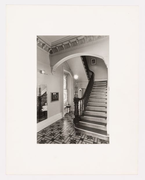 Interior view of the original carved wooden stairs in the west part of Shaughnessy House, Montréal, Québec, Canada
