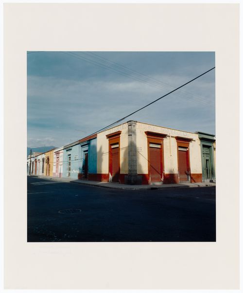 View of a street corner showing a row of shops, Oaxaca, Mexico