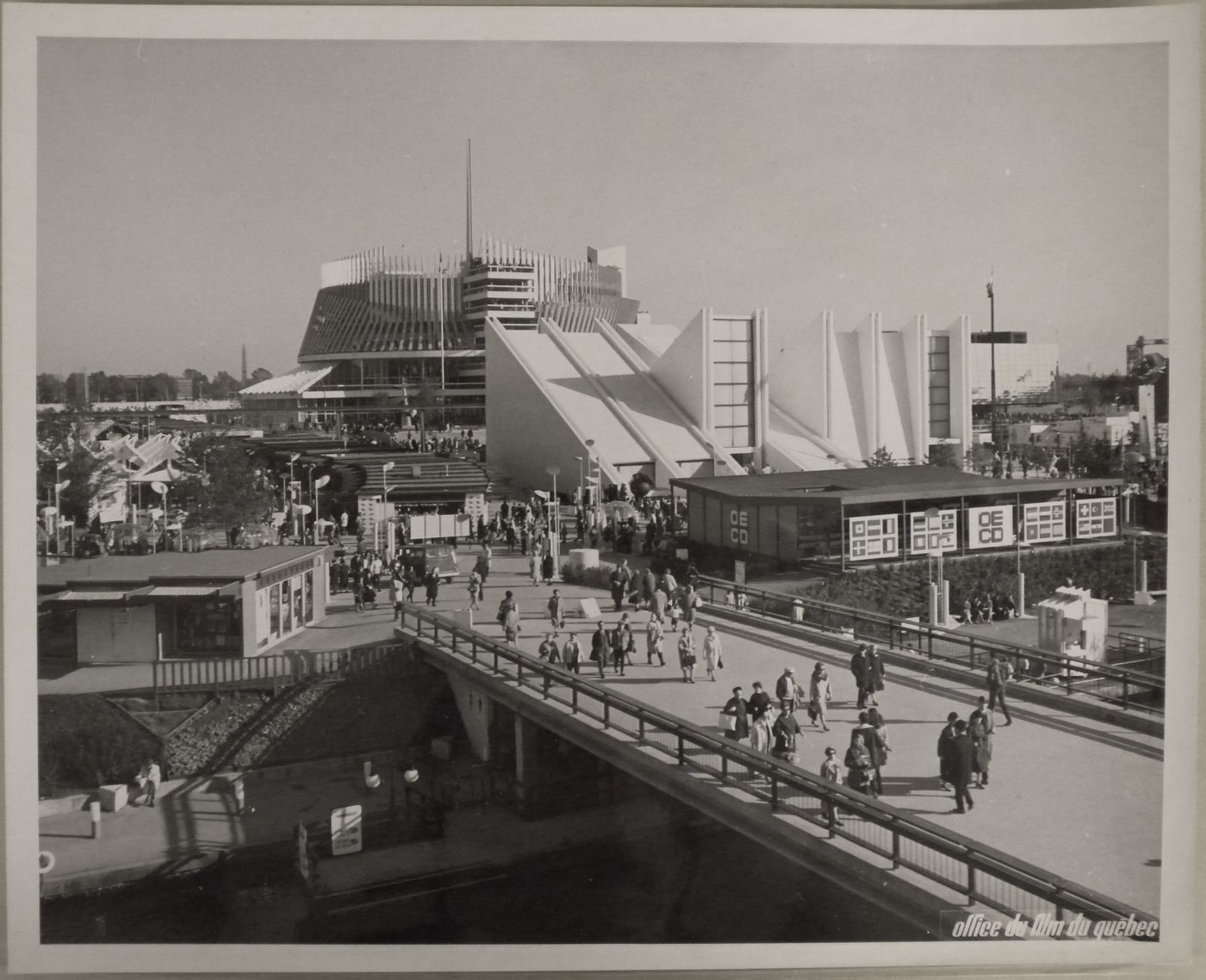 View of the bridge leading to the OECD and Yugoslav Pavilions with the Pavilion of France in background, Expo 67, Montréal, Québec
