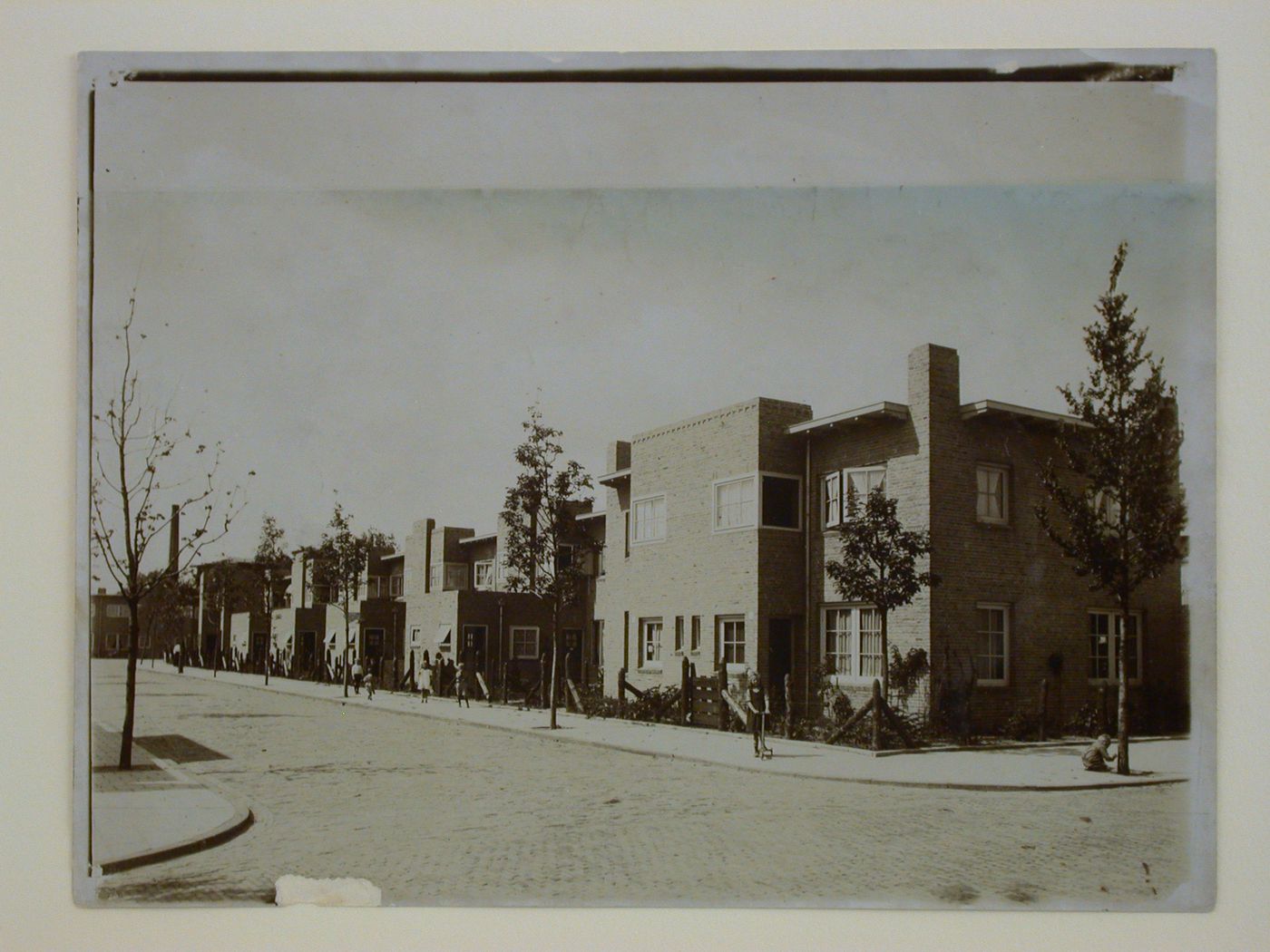 View of the Woningbauw [Housing Project] Rosehaghe with children playing in the foreground, Haarlem, Netherlands