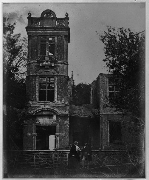 View of ruins of Houghton House, two figures in foreground, Ampthill, England