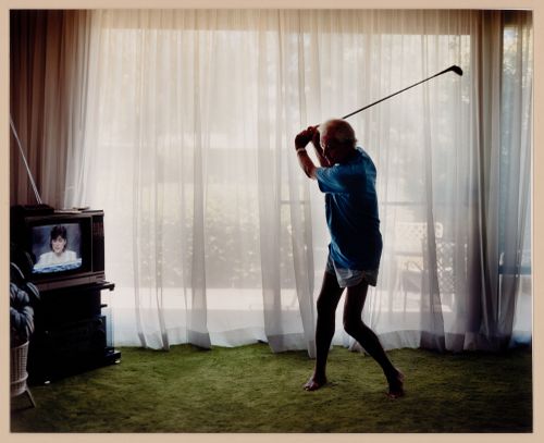 "Practicing Golf swing" from the series "Pictures From Home"