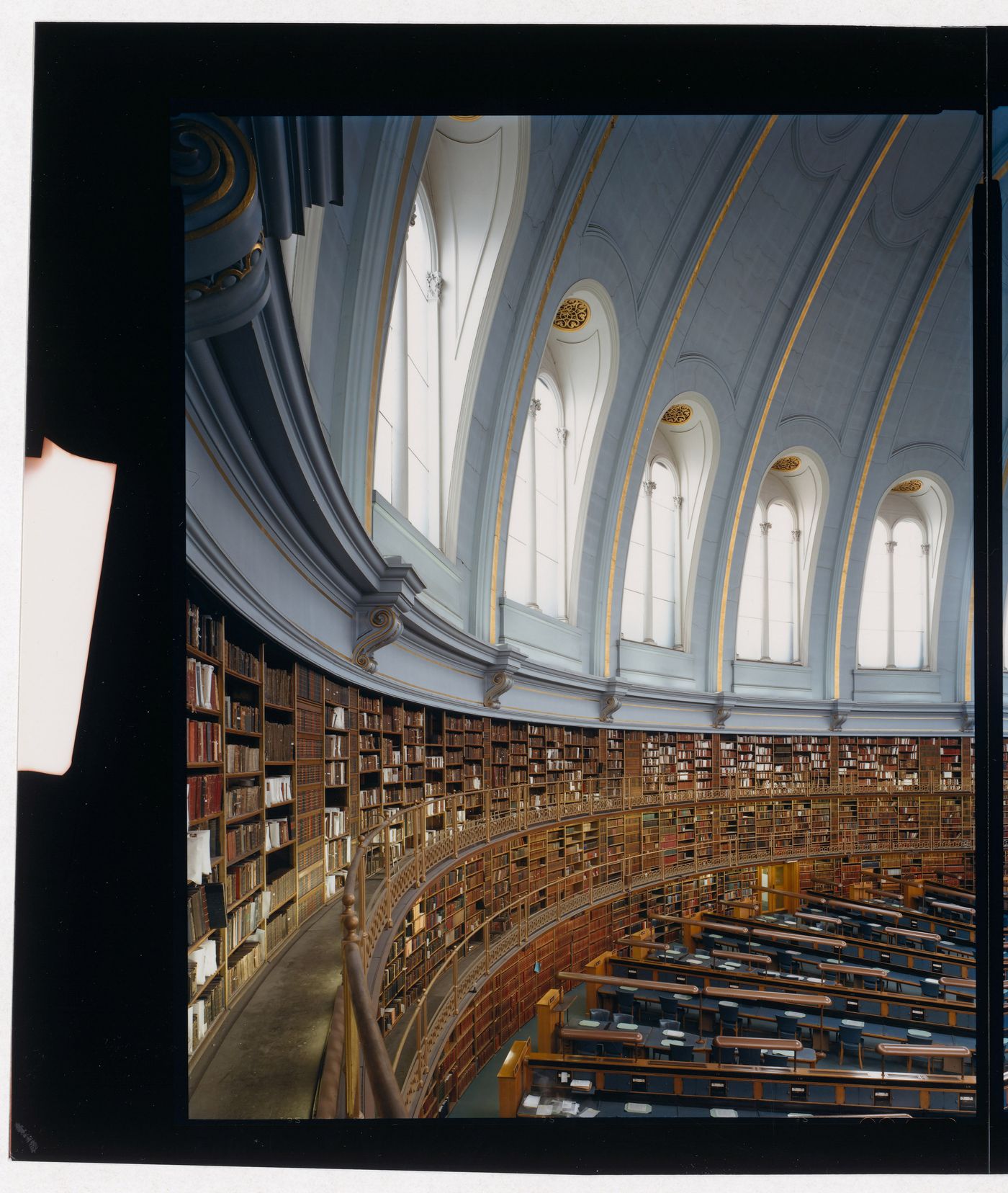 Partial interior view of the Reading Room showing the domed roof, galleries and desks, the British Museum, London, England