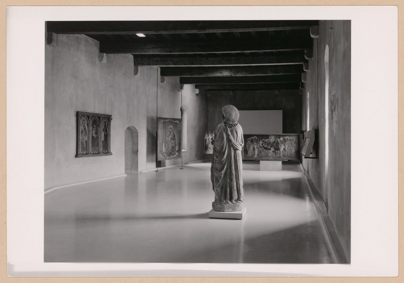 Interior view of a gallery showing a statue and paintings, Museo di Castelvecchio, Verona, Italy