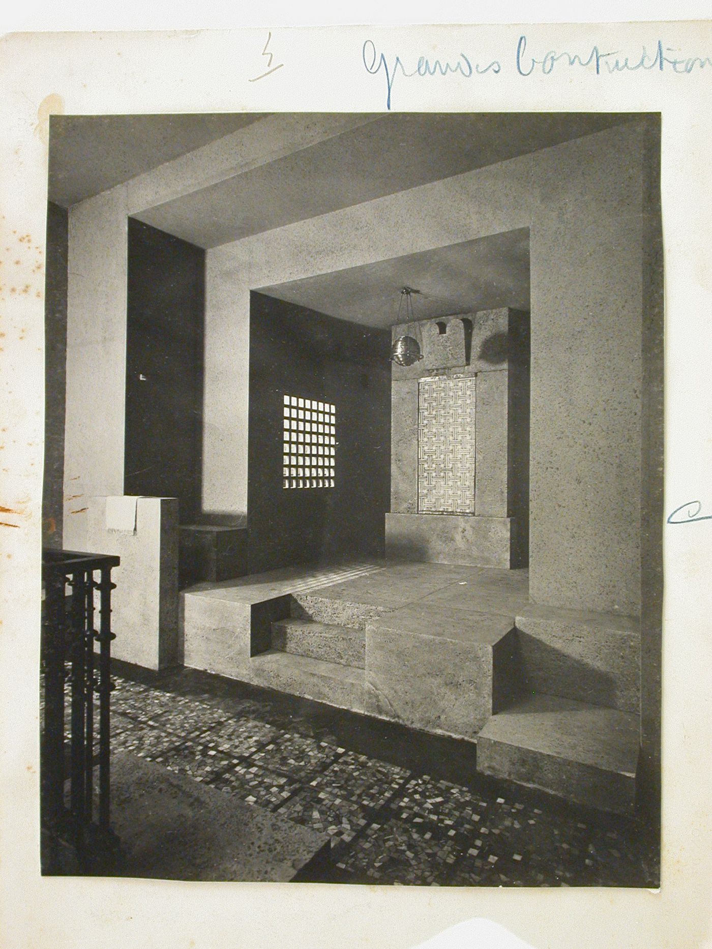 Interior view of a crypt with steps and mural, squared window and ceiling lamp, Germany