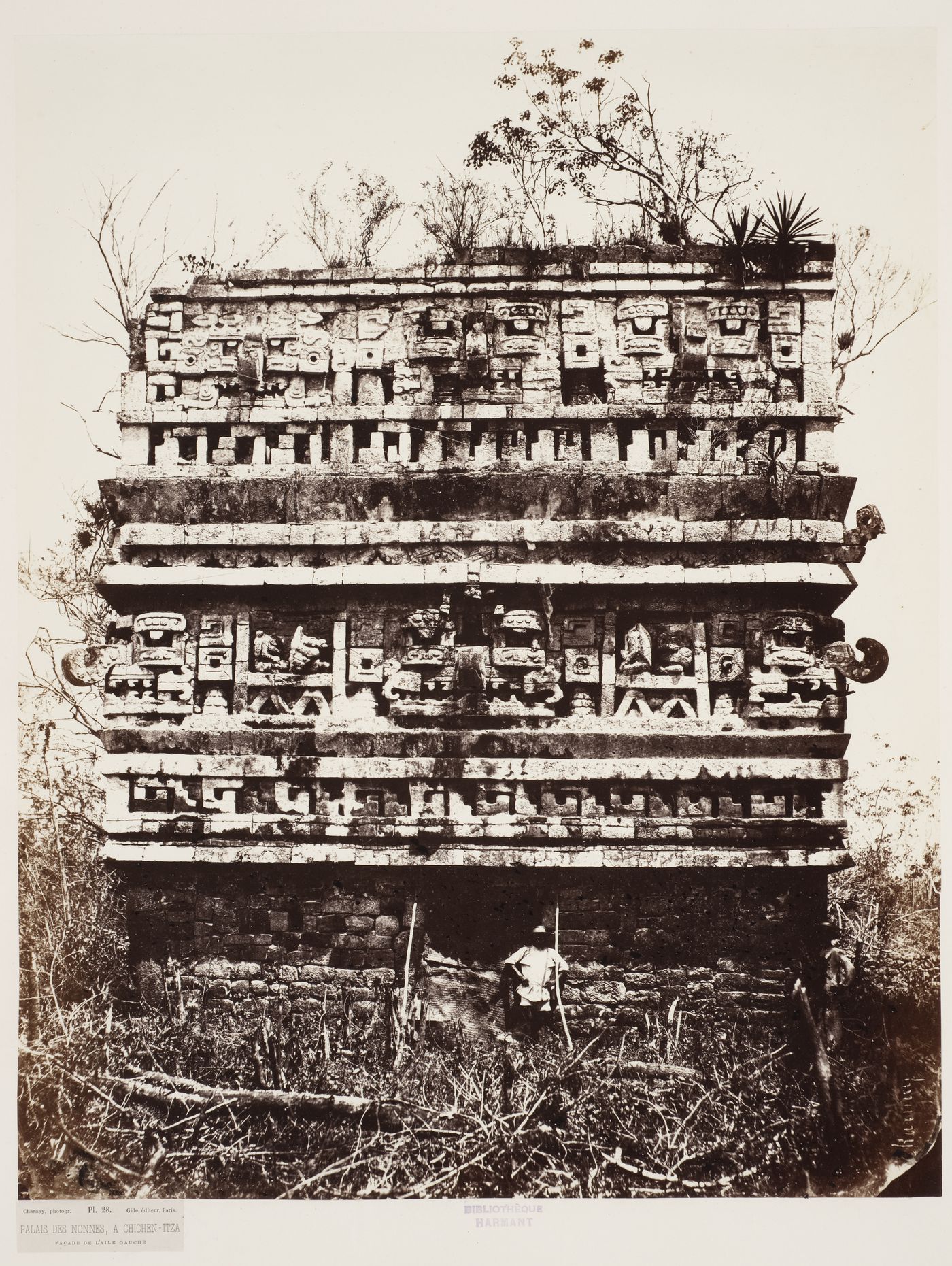 Partial view of Las Monjas [the Nunnery] (also known as the Nun's Palace) showing reliefs on the left wing, Chichén Itzá Site, Yucatán, Mexico