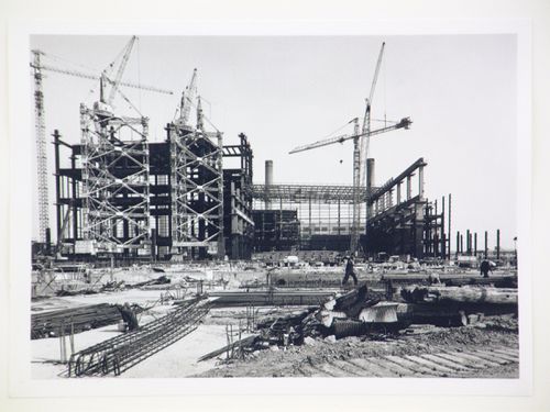 View of cranes and construction of steel structure for power station, from exterior, United Kingdom