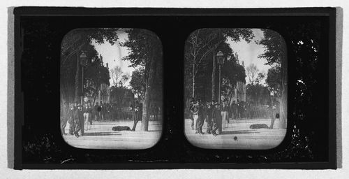 Street scene with small crowd of people, Paris, France