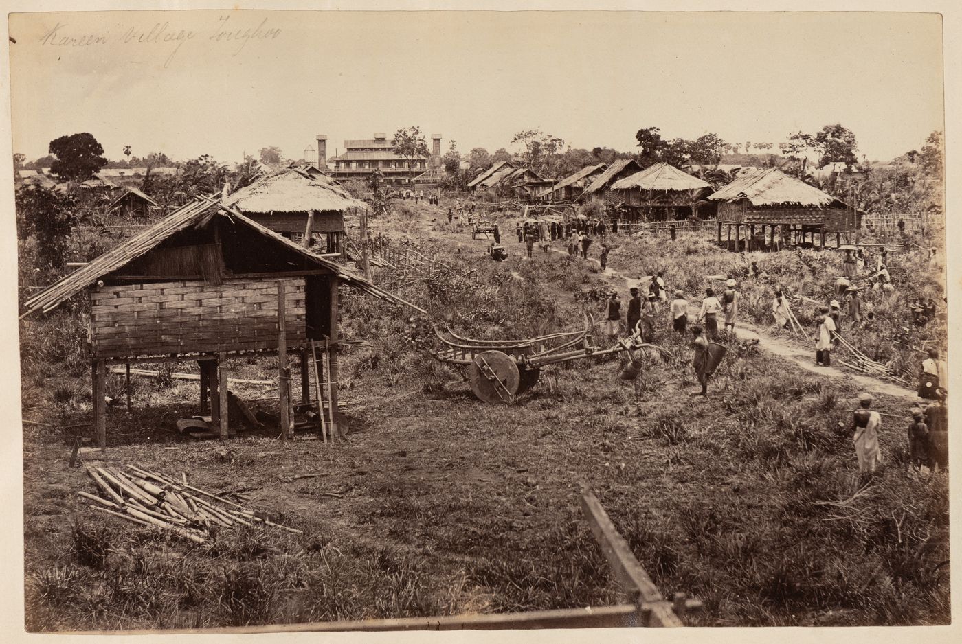 View of Kareen Village [?] showing stilt houses and people, Toungoo [?], Burma (now Myanmar)