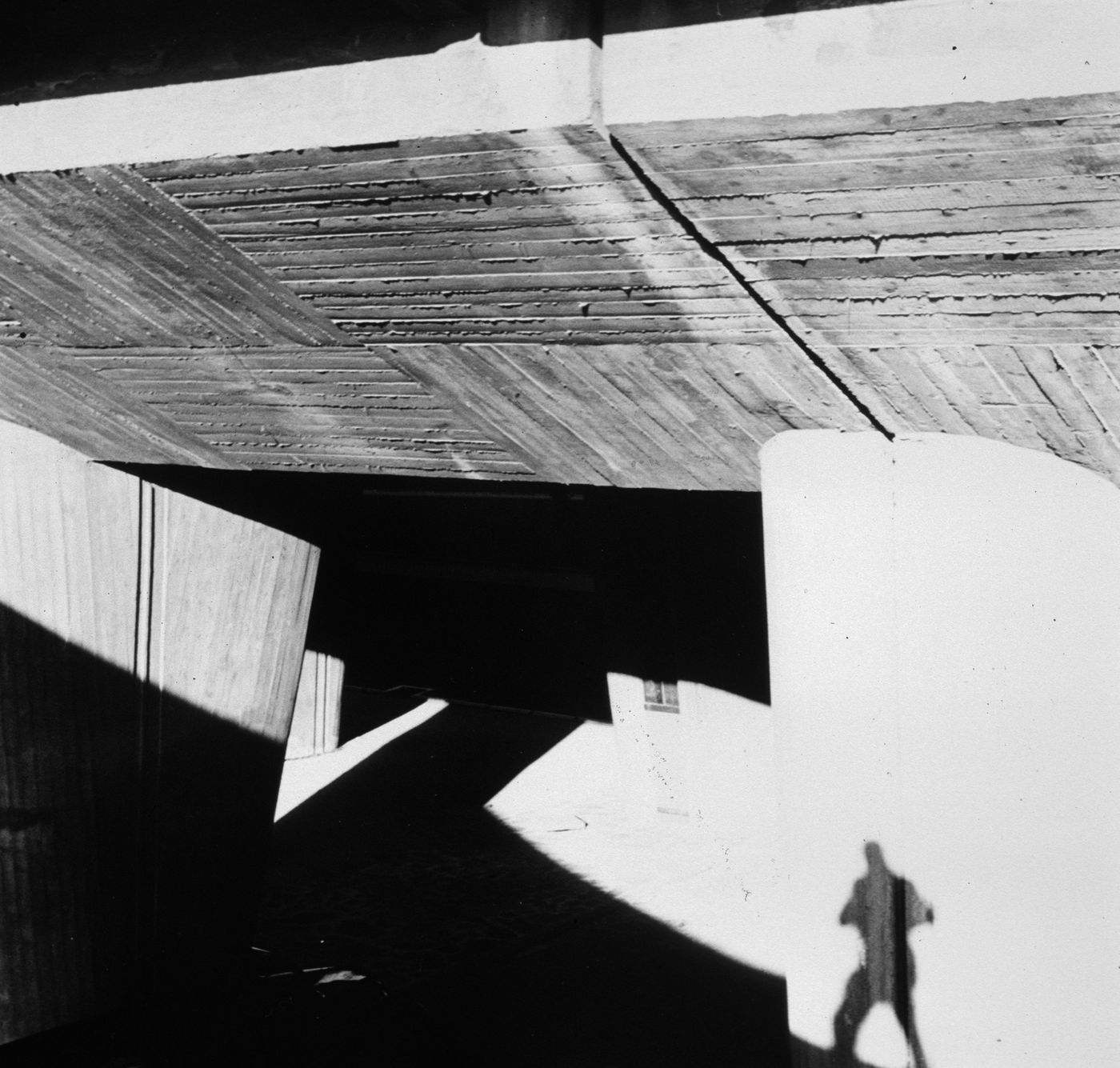 Exterior view of the walkway to the principal entrance of Unité d'habitation showing the overhang and pilotis, Marseille, France
