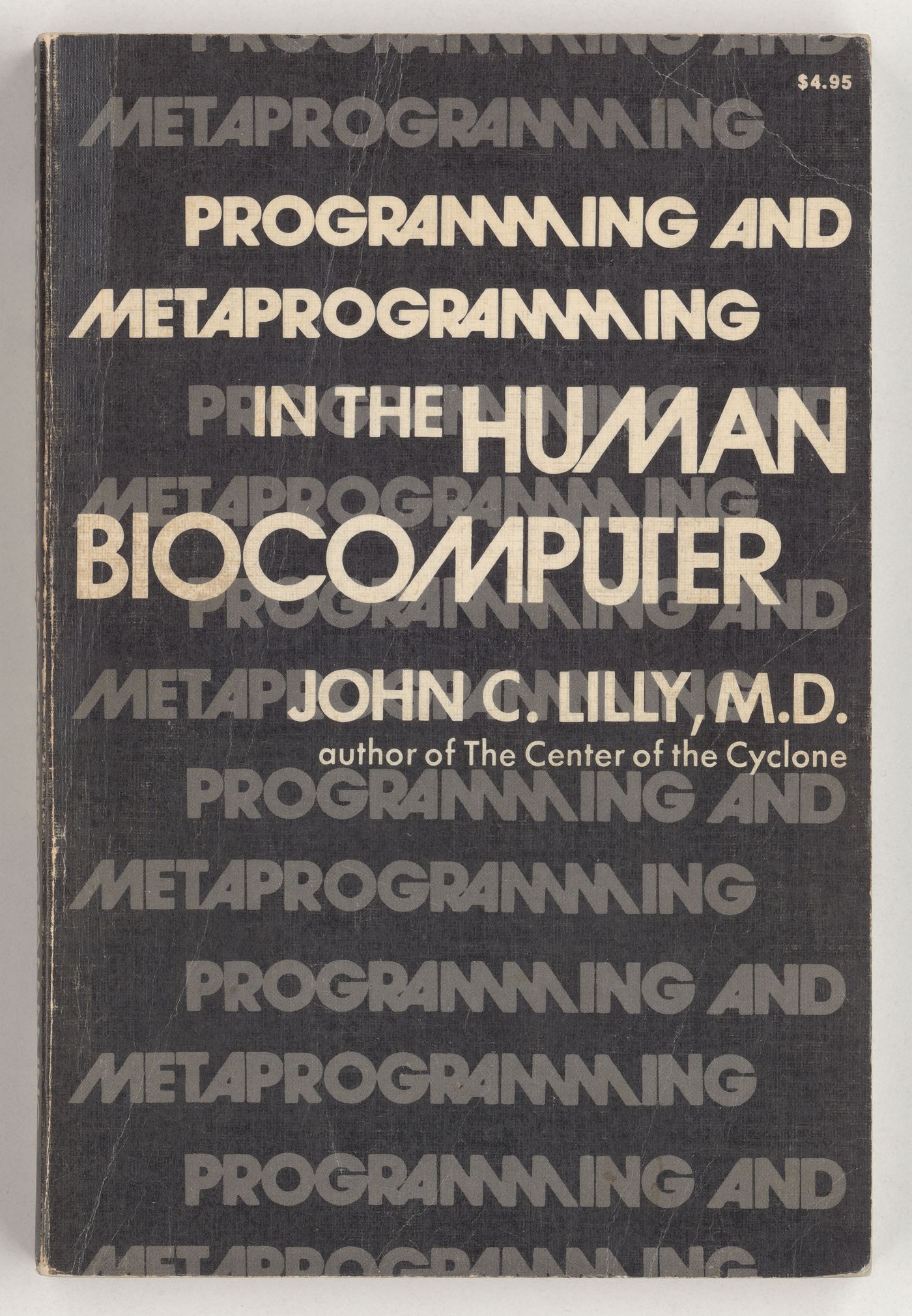 Programming and Metaprogramming in the Human Biocomputer