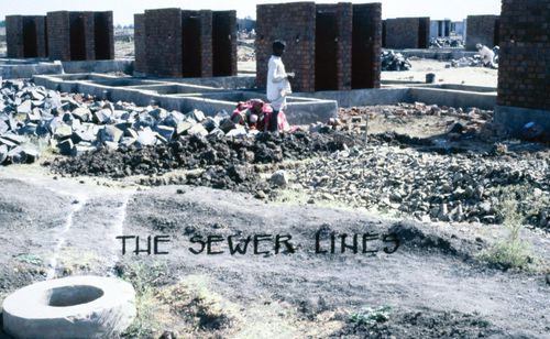 View of Aranya township during construction of sanitary installation used for the Human Settlement Training Package "Package 2: Affordable Urban Design"
