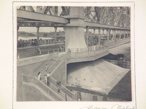 View staricase leading to Howrah Bridge over the Hooghly River, West Bengal, India