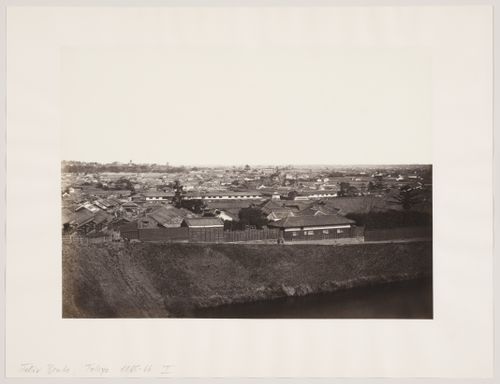 View of central Edo (now Tokyo), with the outer [?] moat of Edojo [Edo Castle] in the foreground, Japan