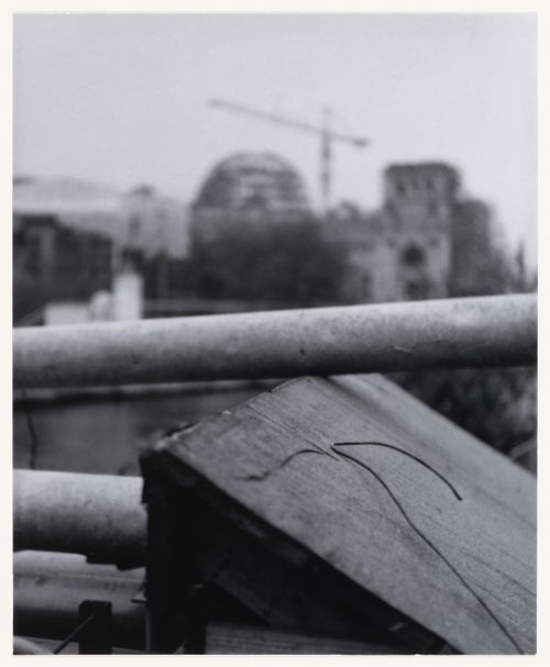 View of pipes, wood and wire in the foreground and the Reichstagsgebäude under reconstruction and other buildings in the background, Berlin, Germany, from the artist book "The Potsdamer Project"