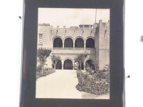 Partial view of the western façade of the Palacio de Cortés with a garden in the foreground, Cuernavaca, Mexico