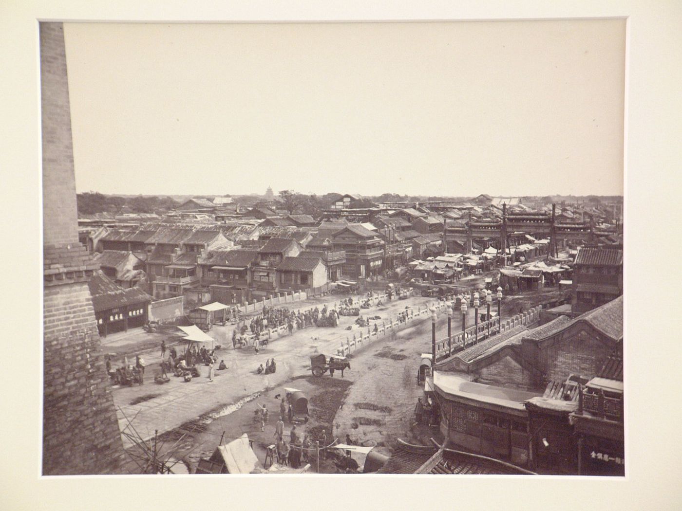 View of the Beggars' Bridge from the top of the city wall showing the Chinese City, Peking (now Beijing), China