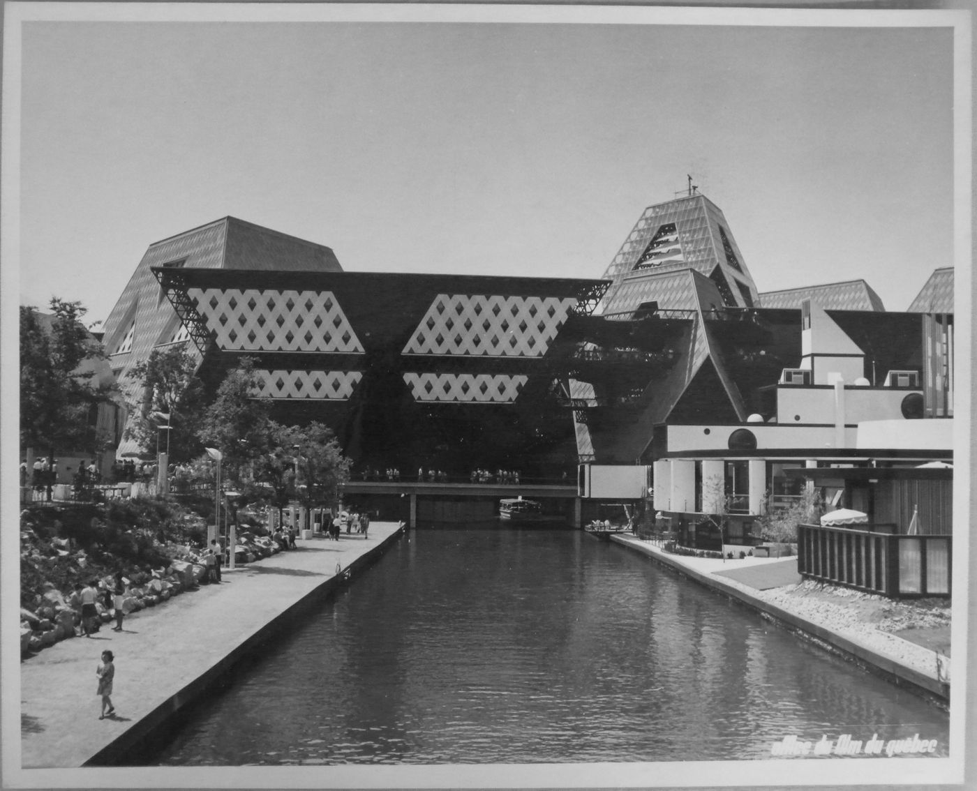 View of a waterway with the Man the Producer and Cuban Pavilions, Expo 67, Montréal, Québec